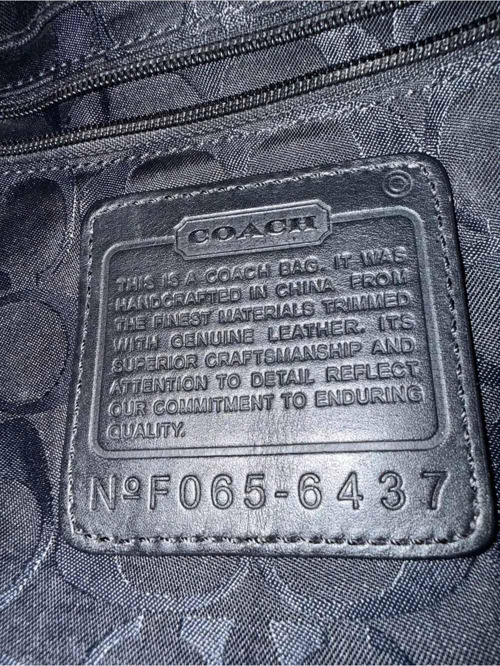 Coach leather trim messenger bag